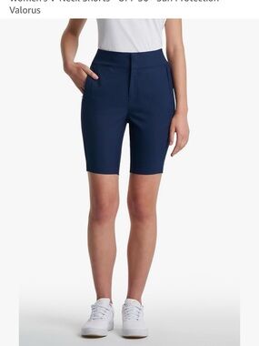 Coolibar UPF50+ tailored cooling shorts, NET, Navy, Size 10-12.